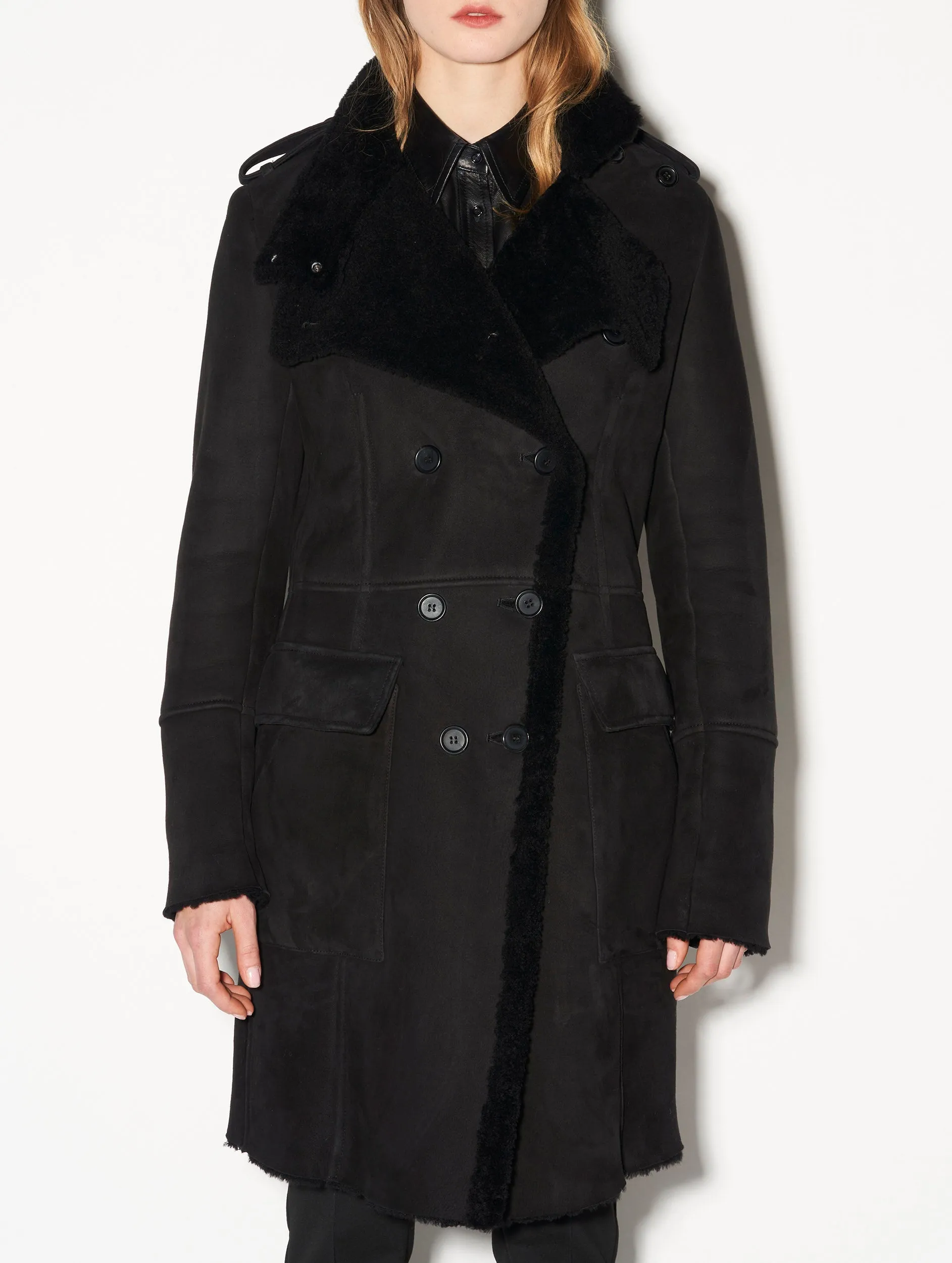 Black double-breasted shearling coat