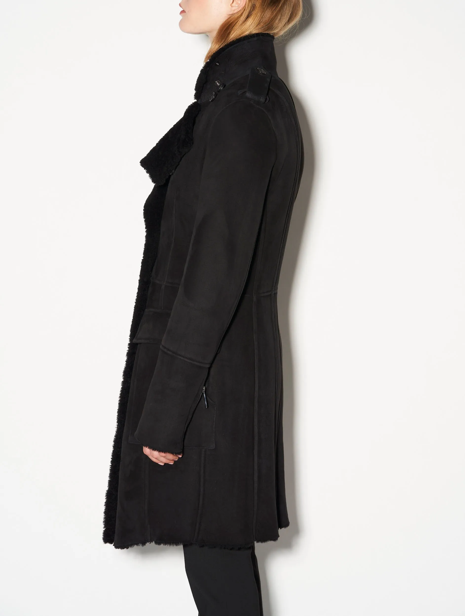 Black double-breasted shearling coat